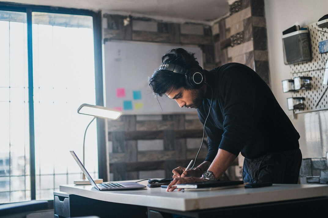 person at desk working productively