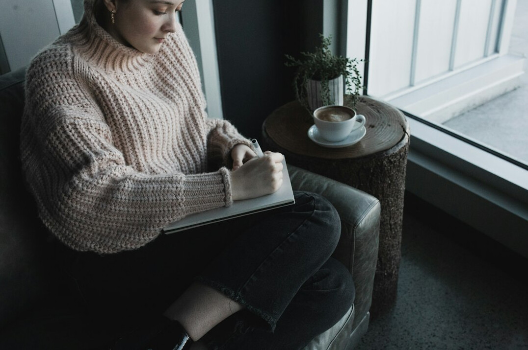 person journaling morning routine