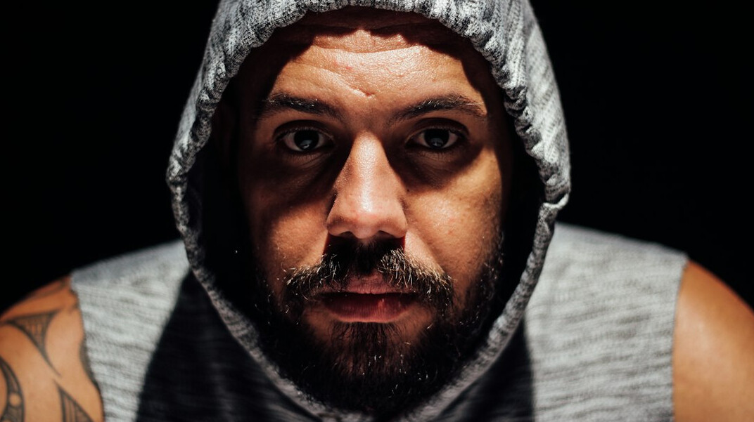 Portrait of a bearded man looking at the camera
