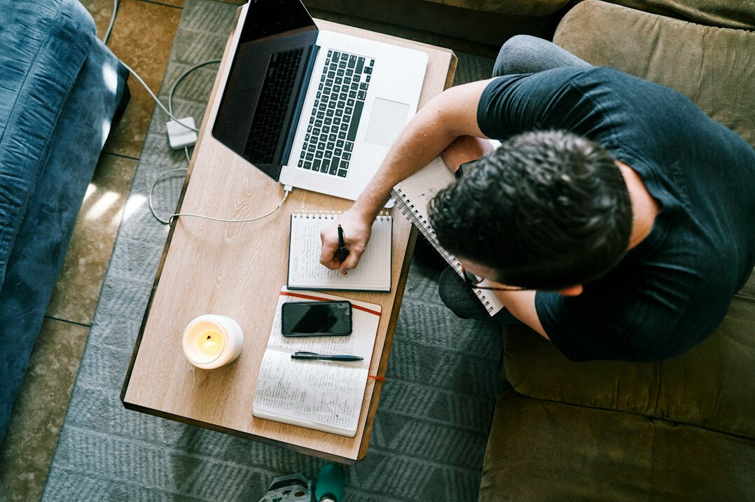 person at desk working productively