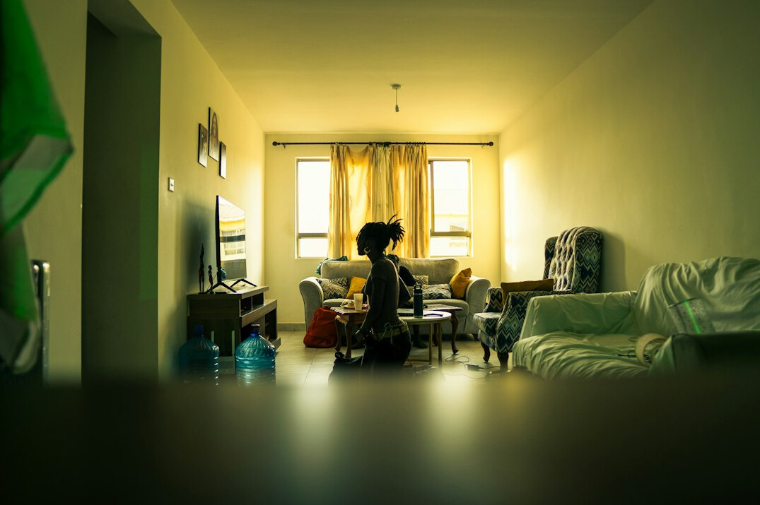 woman reading book in quiet room